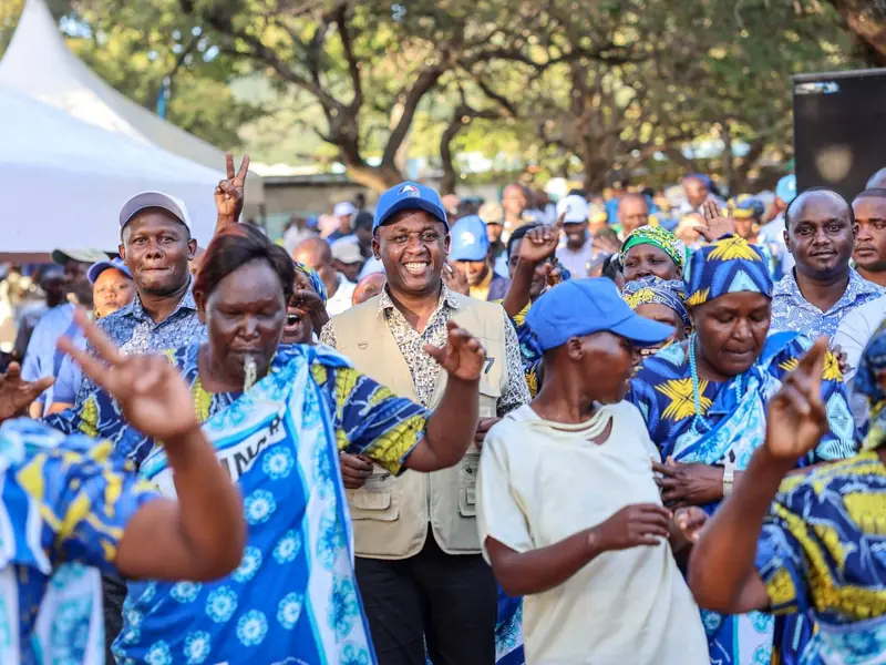 Governor Mutula Kilonzo Jr. smiling among residents during a community gathering in Mbitini Ward.